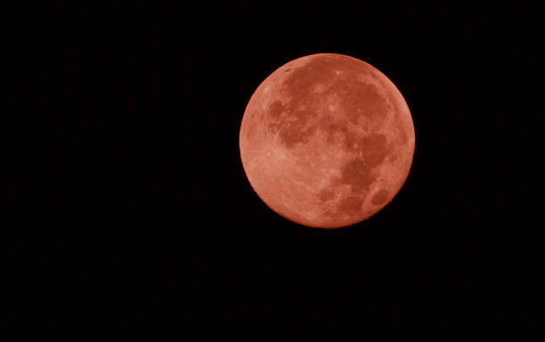 istock Super full moon in the dark night 1127899998