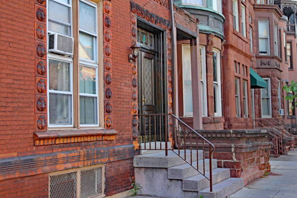 istock row of old brownstone type townhouses 1127904092