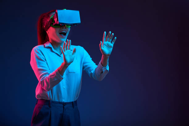 istock Joyful business lady in vr goggles 1127905295