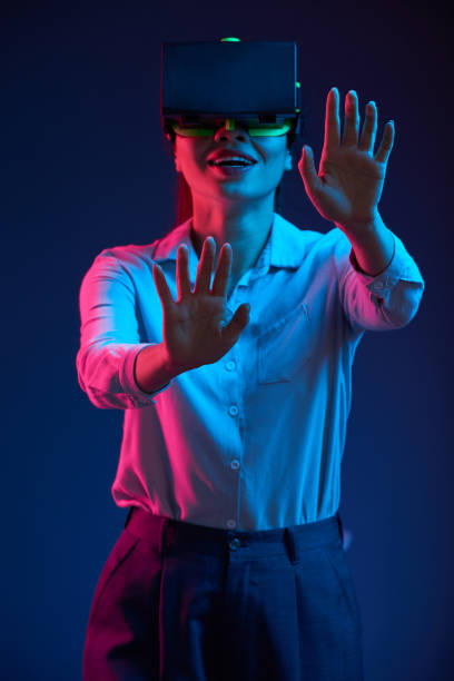 istock Woman playing game in virtual reality 1127905305
