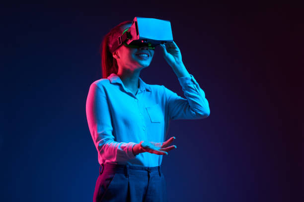 istock Positive businesswoman in vr headset 1127905320