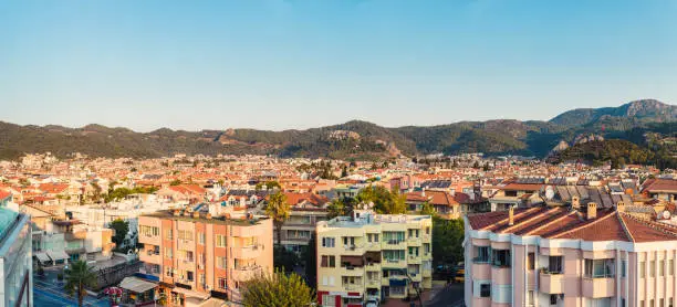 Photo of Panoramic view of old street around Castle in Marmaris Town. Marmaris is popular tourist destination in Turkey. Residential area of Marmaris, not far from the castle