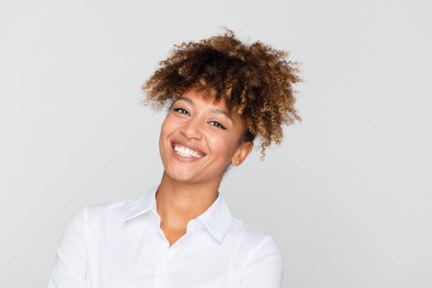 istock African businesswoman looking happy 1127908343