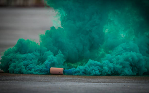 istock Colorful pink smoke bombs action in showing 1127909790