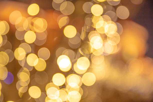 istock Golden Glittering Bokeh Background 1127911724