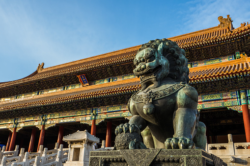 lion sculpture and palace in the forbidden city