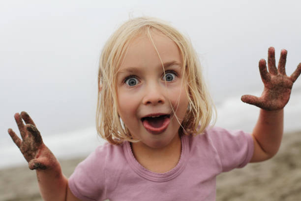 istock Crazy Little Girl with Wide Eyes 1127920925