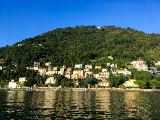 istock Mountainside Houses Reflect on Lake Como 1127921716