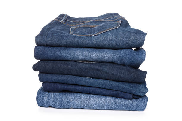 istock A stack of clothes jeans pants on a white background. Isolation 1127923931