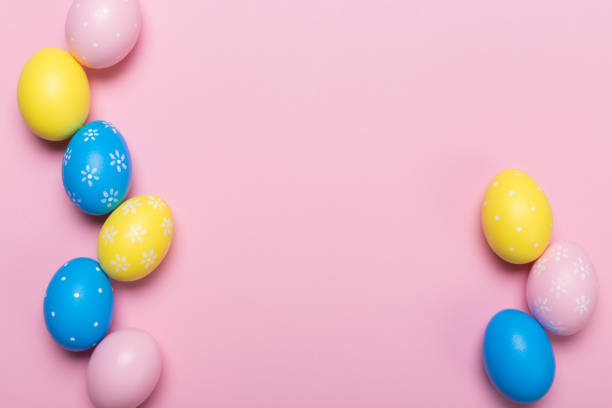 istock Colorfull easter eggs in nest on pastel color background with space. Concept 1127924010