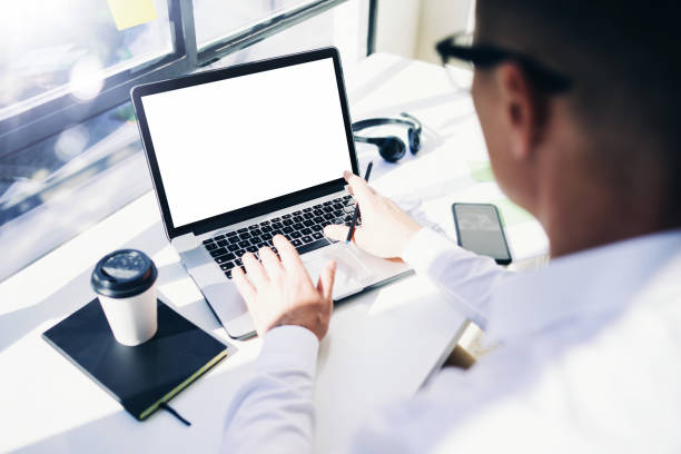 istock Businessman with laptop 1127924115