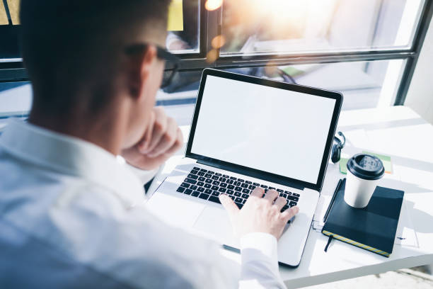 istock Businessman with laptop 1127924117