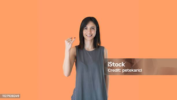 Woman Using Sign Language J Stock Photo - Download Image Now - 2019, 25-29 Years, Adult