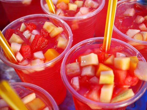 Fresh Summer Fruit Punch Closeup Photo of Cooling Fresh Summer Fruit Punch for Party punch drink stock pictures, royalty-free photos & images