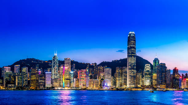 istock Hong Kong night viewed from Victoria harbor 1127933216