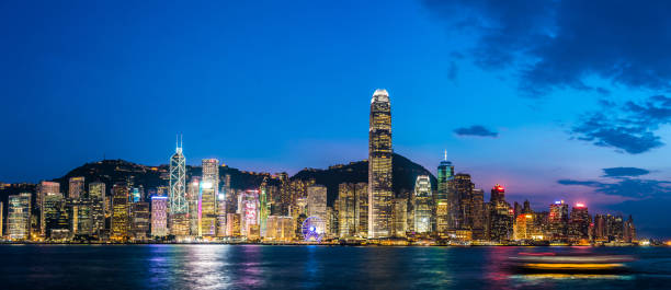 istock Hong Kong night viewed from Victoria harbor 1127933416