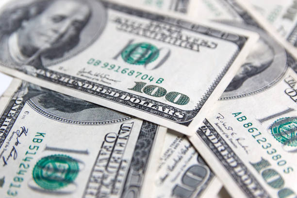 istock Texture US dollars. Background of one hundred dollar bills 1127935827