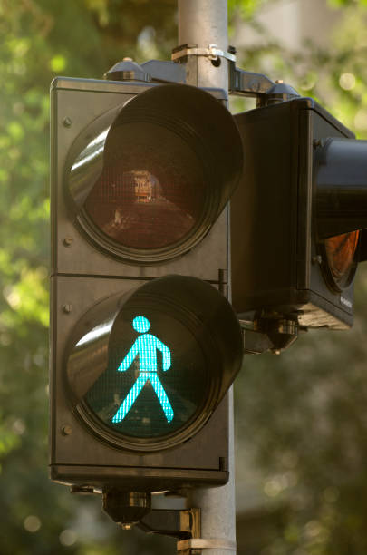 istock Pedestrian traffic light with green light lit on 1127936668