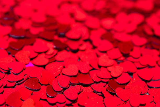 istock Red hearts confetti texture. Happy Valentines day background. 1127938457