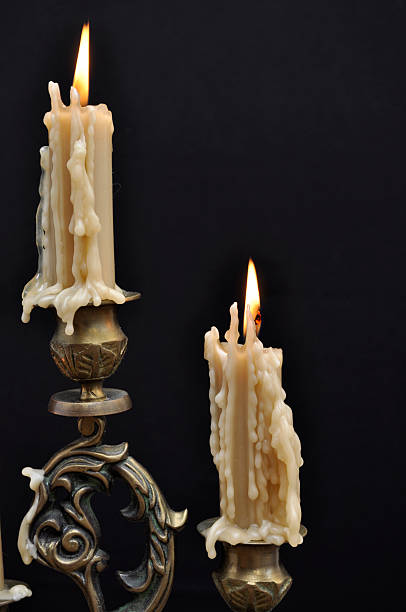 Two melting candles  candle wax stock pictures, royalty-free photos & images