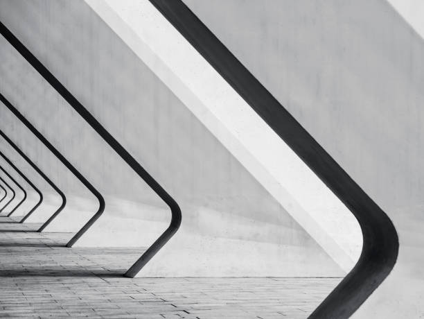 corner wall and window of modern tall office building without people abstract architectural monochromatic background