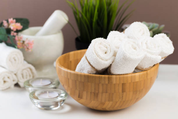 istock Spa still life with aromatic candles, flower and towel. - Image 1127942690