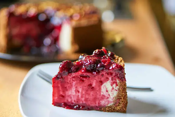 Baking cheesecakes with forest berries