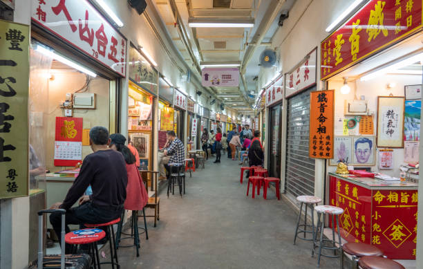 fortune-telling stalls outside wong tai sin temple in hong kong - medium group of people imagens e fotografias de stock