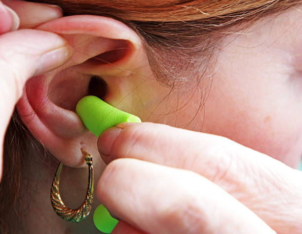 Putting Ear Plug In Ear 310+ Putting In Ear Plugs Stock Photos, Pictures & Royalty-Free Images ...