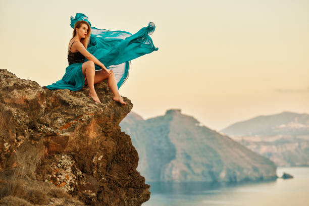 istock cool woman on the rocks 1127948953