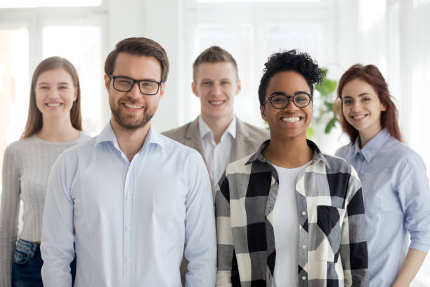 istock Multiethnic professional leaders and employees looking at camera, portrait 1127950060