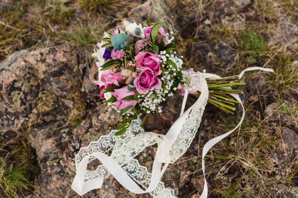 istock small stylish bridal bouquet with lace Ribbon 1127950779