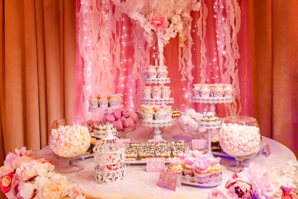 istock sweet table with cakes on hot-warm buffet table 1127950831