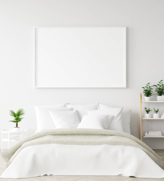 istock Mock-up poster frame in bedroom, Scandinavian style 1127951200
