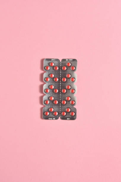 istock medicine blister on pink blackground 1127955562