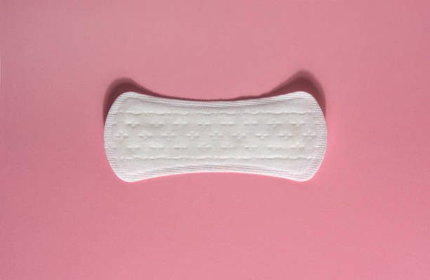 compress for menstruation on pink - padding imagens e fotografias de stock