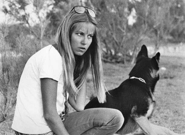Young woman with german sheperd in 1970