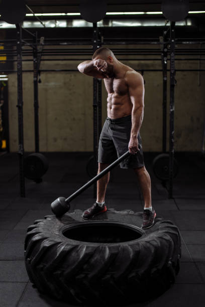 istock exhausted sportsman is mopping his brow after hard training 1127955937