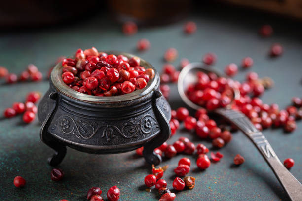 istock Pink pepper in vintage bowl 1127956838