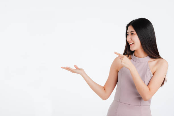 istock Beautiful woman posing hands for advertising. 1127958395