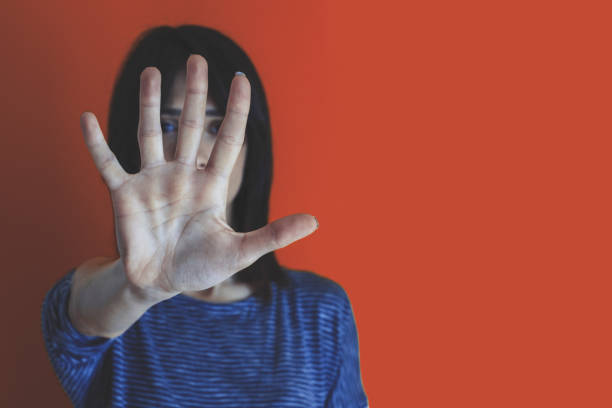 istock Woman making stop gesture with her hand 1127959439