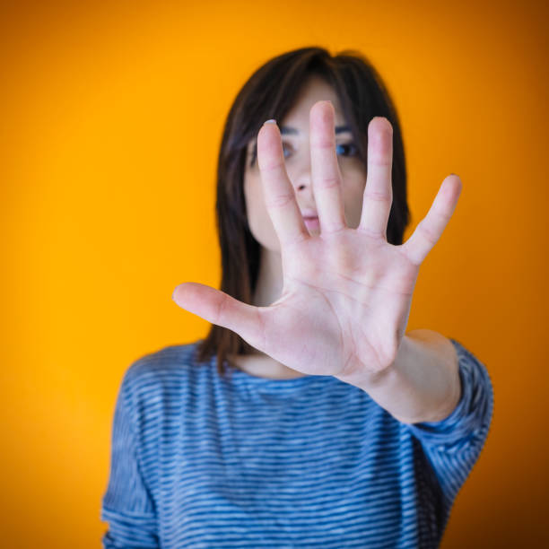 istock Woman making stop gesture with her hand 1127959517