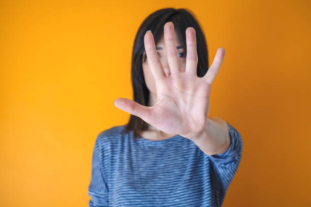 istock Woman making stop gesture with her hand 1127959589