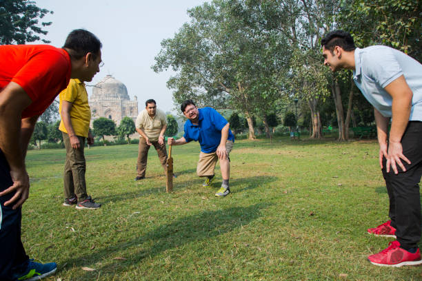 istock Playing cricket - stock images 1127960074