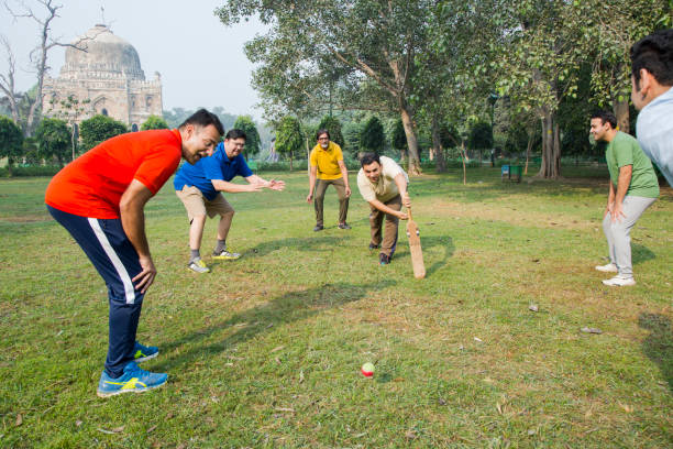 istock Playing Cricket - stock images 1127960975
