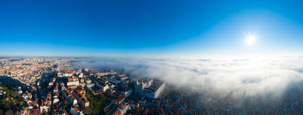 panoramic view of lisbon; old yellow rooftops in portuguese capital - drifted imagens e fotografias de stock