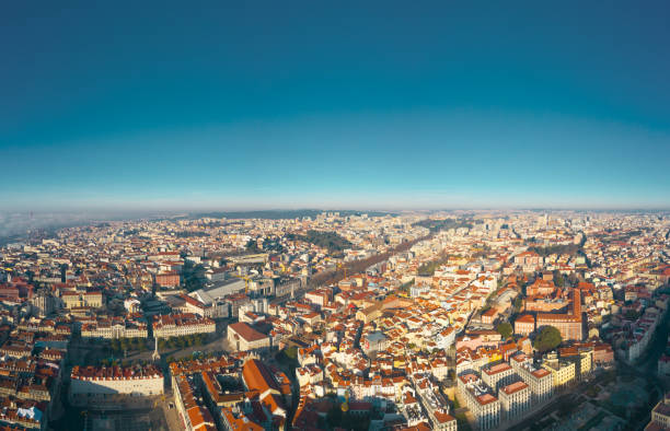 panoramic view of lisbon; old yellow rooftops in portuguese capital - drifted imagens e fotografias de stock