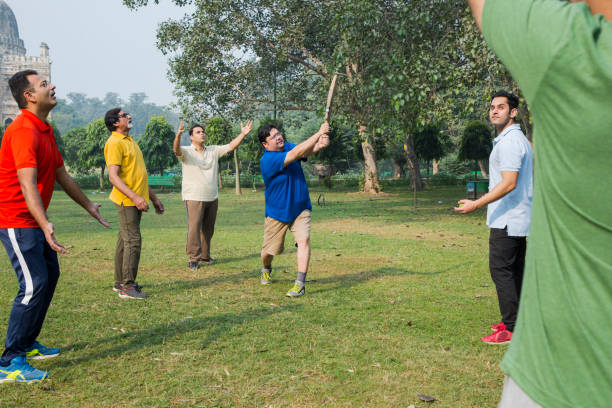 istock Playing Cricket - stock images 1127961248