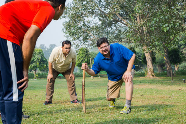 istock Playing Cricket - stock images 1127961512