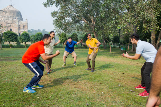 istock Playing Cricket - stock images 1127961610